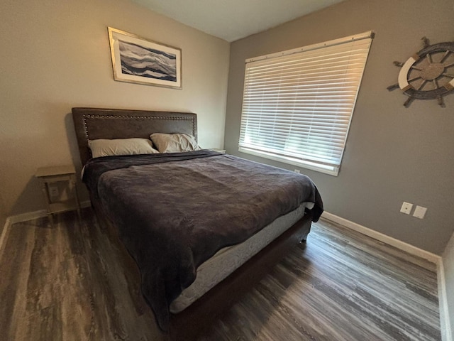 7824 Maple St, Russells Point, OH 43348 - bedroom with wood finished floors