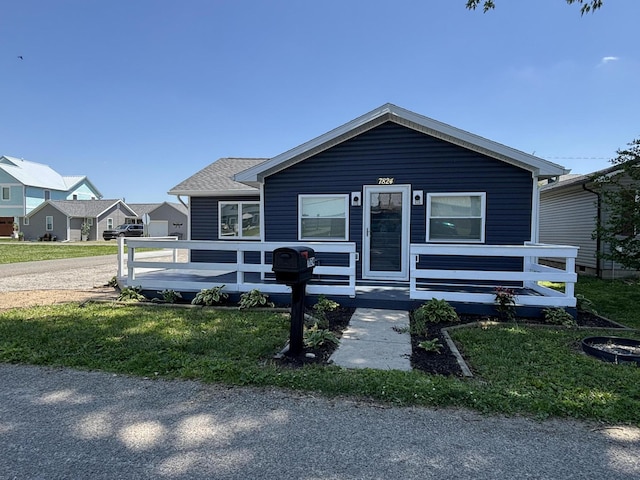 7824 Maple St, Russells Point, OH 43348 - view of front of property with a front yard