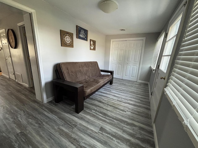 7824 Maple St, Russells Point, OH 43348 - sitting room featuring dark wood-type flooring and baseboards