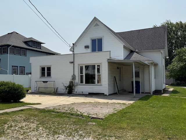 612 W Spring St, Saint Marys, OH 45885 - back of property featuring a yard and a patio area