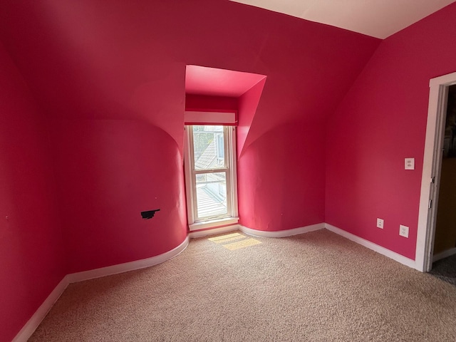 612 W Spring St, Saint Marys, OH 45885 - bonus room with vaulted ceiling, carpet, and baseboards