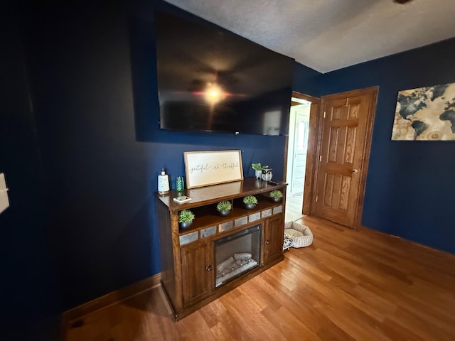 612 W Spring St, Saint Marys, OH 45885 - living room with light wood-type flooring and baseboards