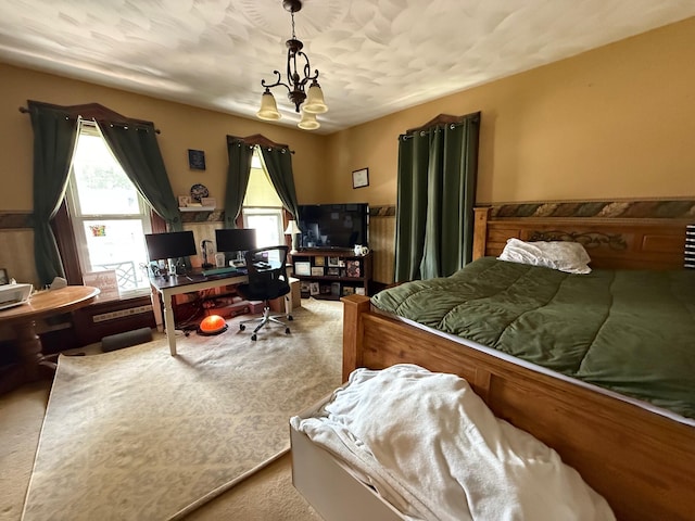 612 W Spring St, Saint Marys, OH 45885 - bedroom featuring a chandelier, an office area, and carpet flooring