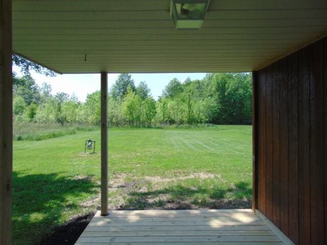 1723 Bermuda Dr, Lima, OH 45801 - view of grassy yard with a wooden deck