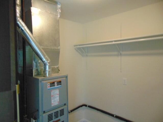 1723 Bermuda Dr, Lima, OH 45801 - utility room featuring heating unit