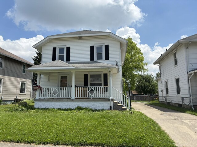 320 N Clairmont Ave, Springfield, OH 45503 - american foursquare style home with covered porch and driveway