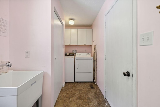930 N Bickett Rd, Xenia, OH 45385 - laundry room featuring cabinet space and washing machine and dryer