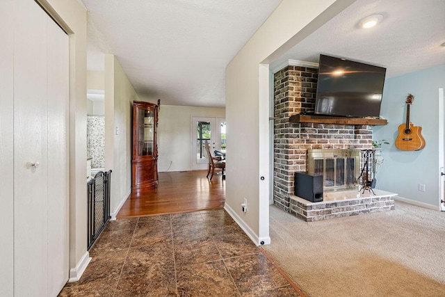 930 N Bickett Rd, Xenia, OH 45385 - corridor with a textured ceiling and french doors