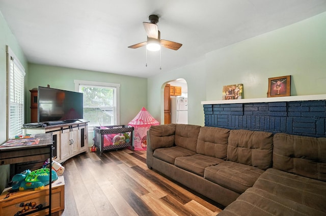 5638 Old Rte 70, Springfield, OH 45502 - living room with dark wood-type flooring, a ceiling fan, and arched walkways