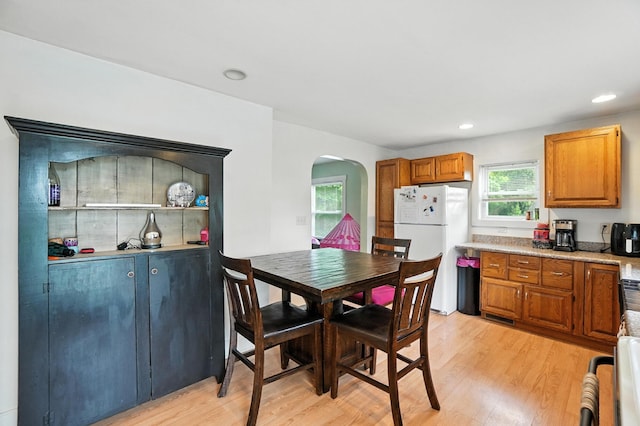 5638 Old Rte 70, Springfield, OH 45502 - dining room with arched walkways, light wood-style flooring, and recessed lighting