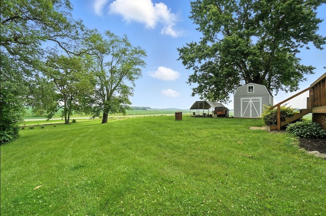 5638 Old Rte 70, Springfield, OH 45502 - view of grassy yard featuring a storage shed and stairs