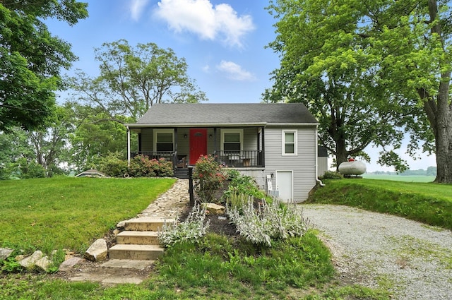 5638 Old Rte 70, Springfield, OH 45502 - view of front of property featuring covered porch, driveway, and a front yard
