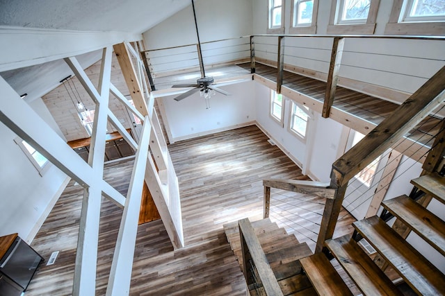 unfurnished living room featuring wood-type flooring