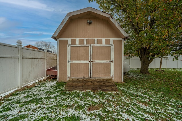 snow covered structure featuring a lawn