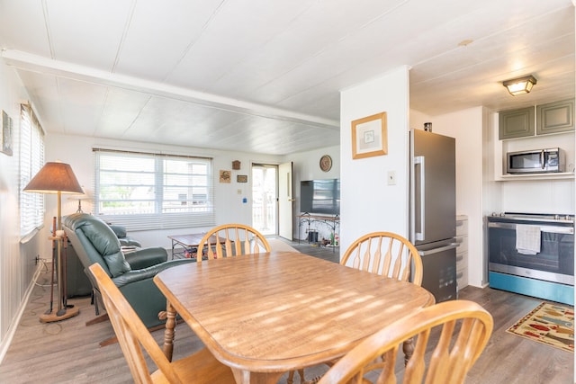 dining area with light wood-type flooring