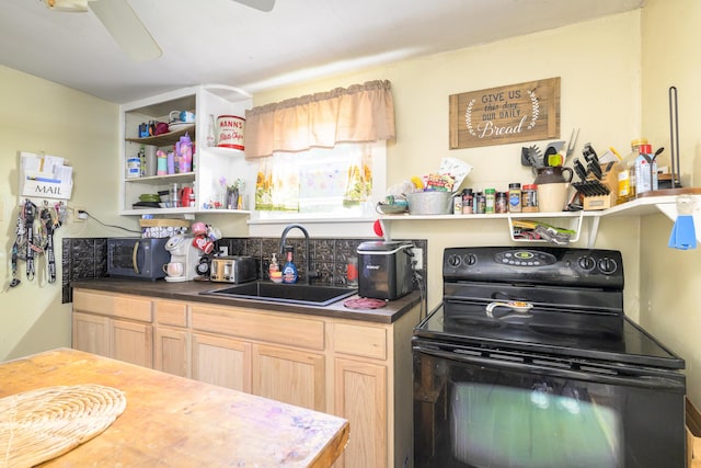 208 E Main St, Belle Center, OH 43310 - kitchen featuring black appliances, light brown cabinetry, dark countertops, and open shelves