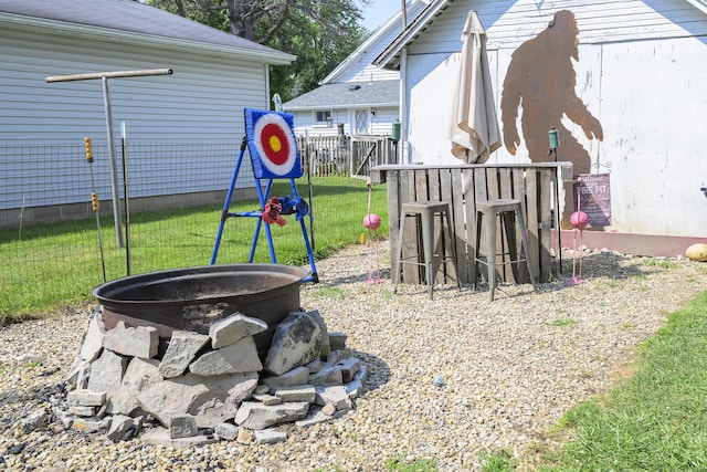 208 E Main St, Belle Center, OH 43310 - view of yard featuring an outdoor fire pit