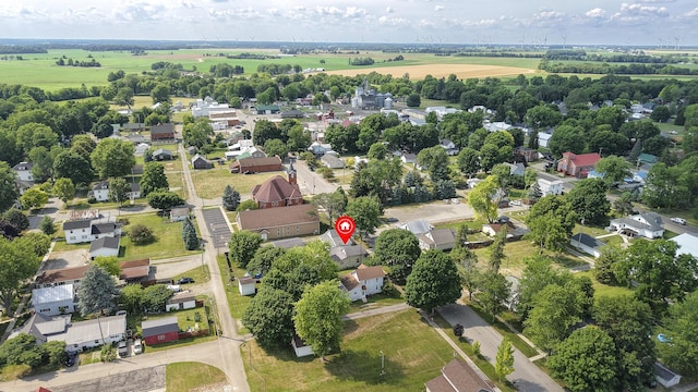 208 E Main St, Belle Center, OH 43310 - aerial overview of property's location with nearby suburban area