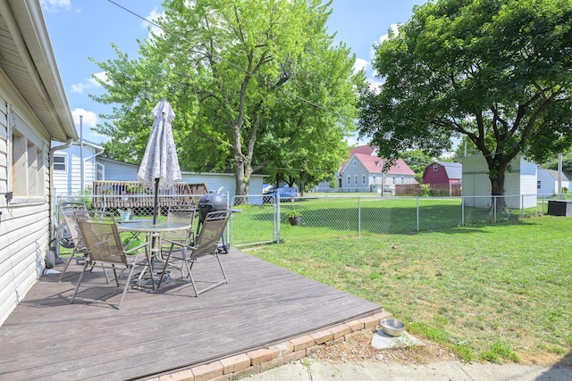 208 E Main St, Belle Center, OH 43310 - wooden deck with outdoor dining space and a fenced backyard