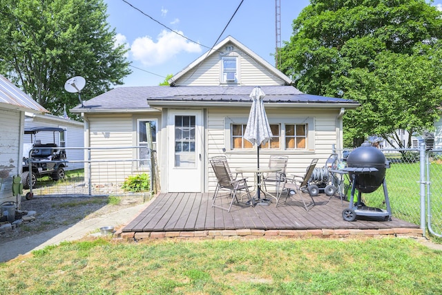 208 E Main St, Belle Center, OH 43310 - rear view of house with a deck and outdoor dining space