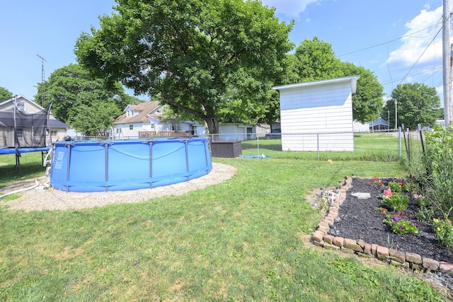 208 E Main St, Belle Center, OH 43310 - view of yard with a trampoline