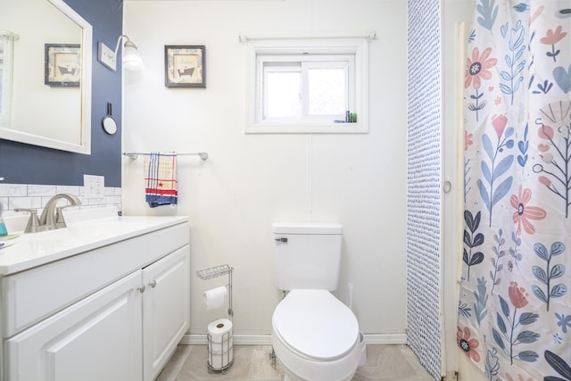 208 E Main St, Belle Center, OH 43310 - bathroom with vanity, curtained shower, and backsplash