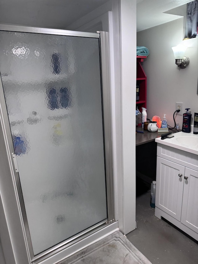 607 W S St, Saint Marys, OH 45885 - bathroom featuring a stall shower, vanity, and concrete flooring