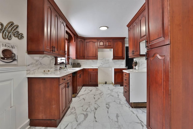 kitchen featuring a sink, decorative backsplash, light countertops, dishwasher, and marble finish floor