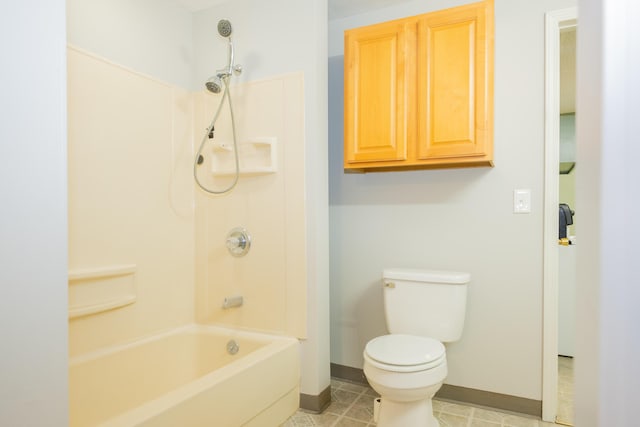 bathroom with shower / tub combination and toilet