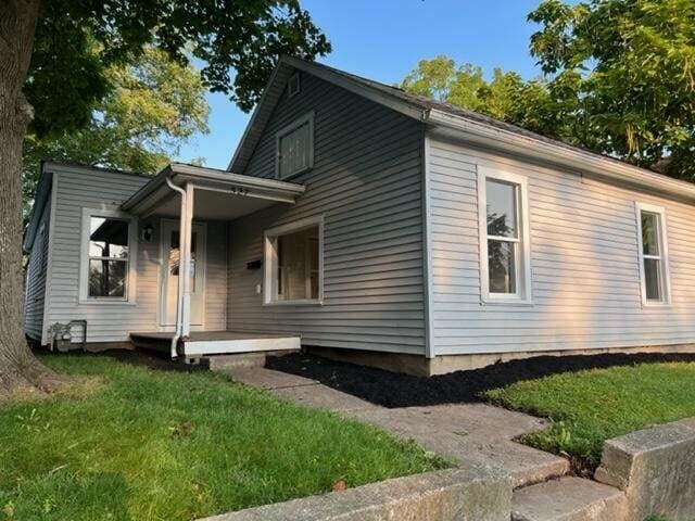 view of home's exterior with a yard