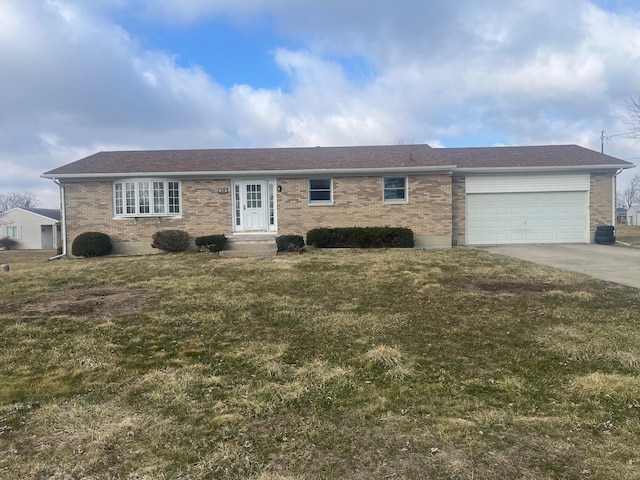 ranch-style house with a garage, driveway, a front lawn, and brick siding