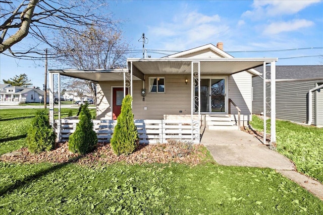 view of front facade with a front yard