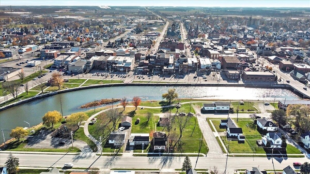 drone / aerial view with a water view