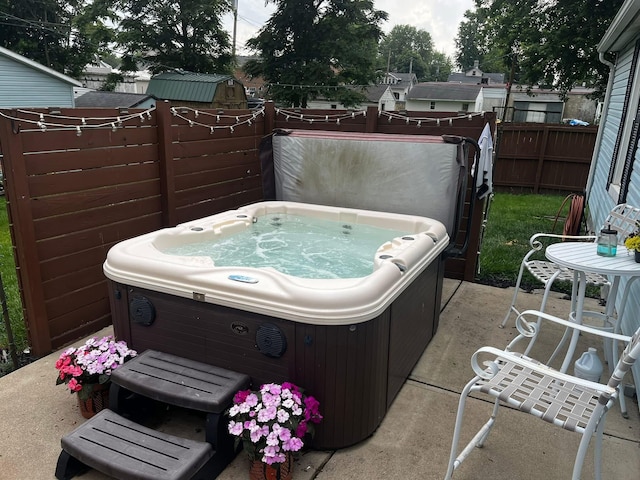 23 E Columbus Rd, South Charleston, OH 45368 - view of patio with a hot tub