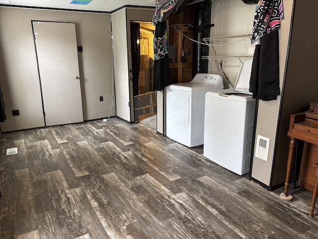 23 E Columbus Rd, South Charleston, OH 45368 - laundry area with separate washer and dryer and wood finished floors