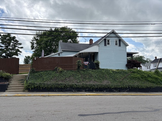 23 E Columbus Rd, South Charleston, OH 45368 - view of front facade featuring stairs