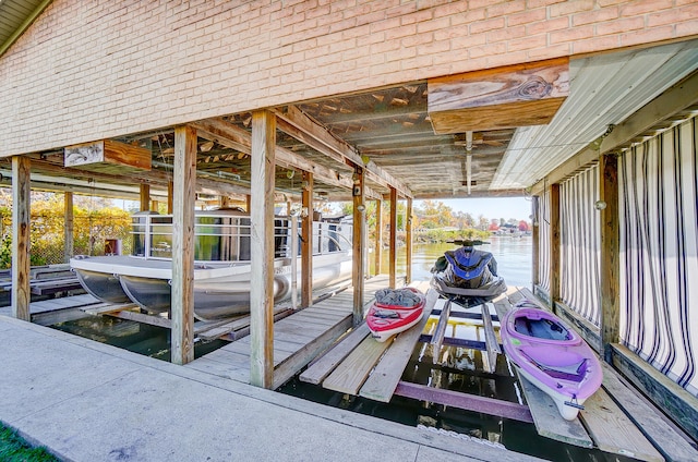 view of dock with a water view