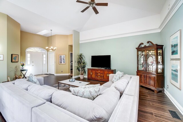 living room featuring ceiling fan with notable chandelier, dark hardwood / wood-style floors, and high vaulted ceiling