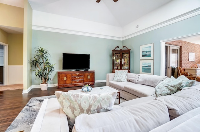 living room with dark hardwood / wood-style flooring, high vaulted ceiling, and ceiling fan