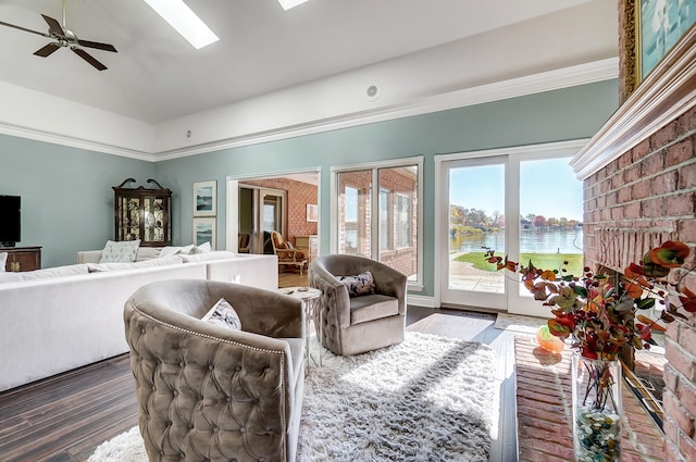 living room featuring a water view, ceiling fan, crown molding, and dark wood-type flooring