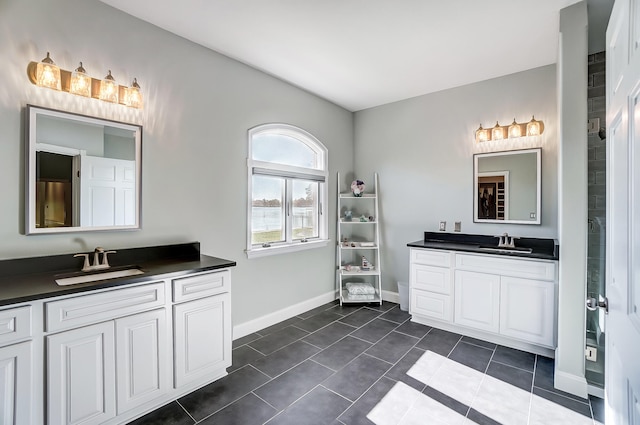 bathroom featuring tile patterned floors and vanity