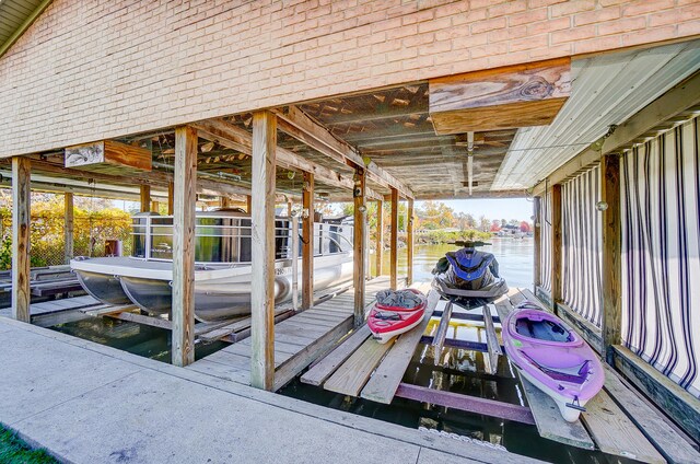 dock area featuring a water view