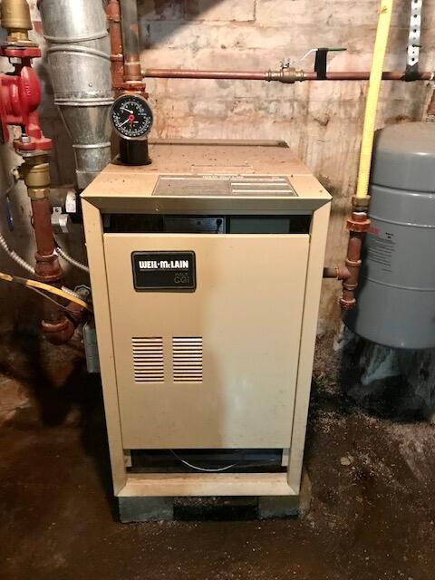 utility room with a heating unit