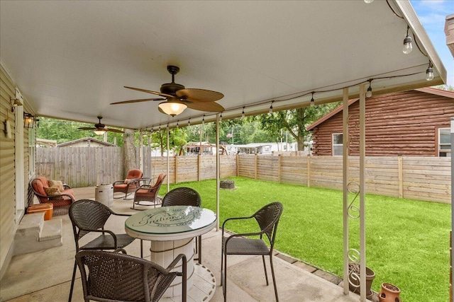 11372 Powhatan Path, Lakeview, OH 43331 - fenced backyard featuring a patio area and ceiling fan