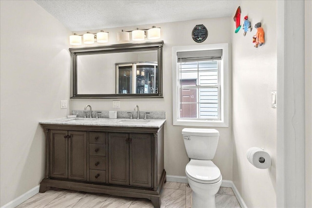 11372 Powhatan Path, Lakeview, OH 43331 - bathroom featuring double vanity and marble look tiles