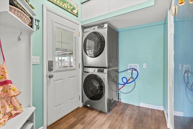 11372 Powhatan Path, Lakeview, OH 43331 - laundry area with estacked washer and dryer and wood finished floors