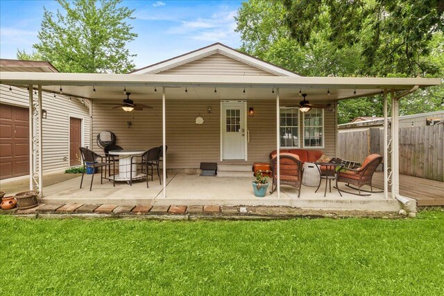 11372 Powhatan Path, Lakeview, OH 43331 - back of house featuring ceiling fan and a patio area