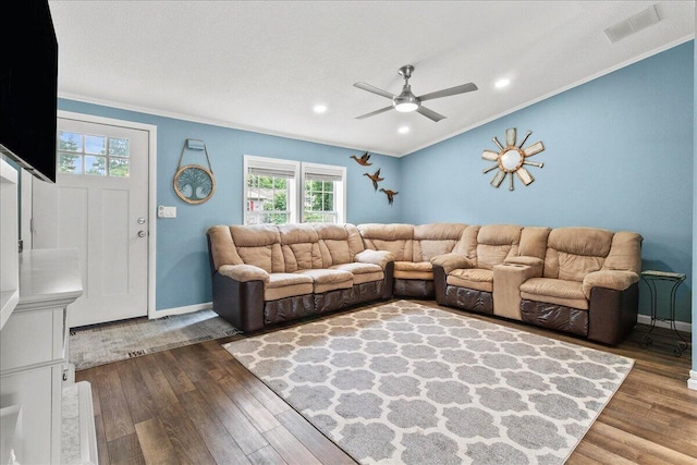 11372 Powhatan Path, Lakeview, OH 43331 - living room featuring healthy amount of natural light, ceiling fan, crown molding, dark wood-style floors, and recessed lighting