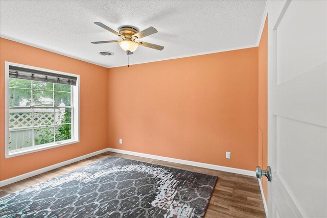 11372 Powhatan Path, Lakeview, OH 43331 - unfurnished room featuring wood finished floors, ceiling fan, and a textured ceiling