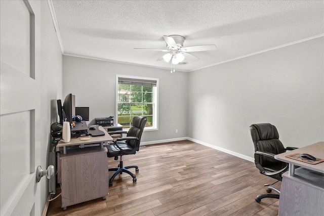 11372 Powhatan Path, Lakeview, OH 43331 - office area featuring a ceiling fan, wood finished floors, a textured ceiling, and crown molding